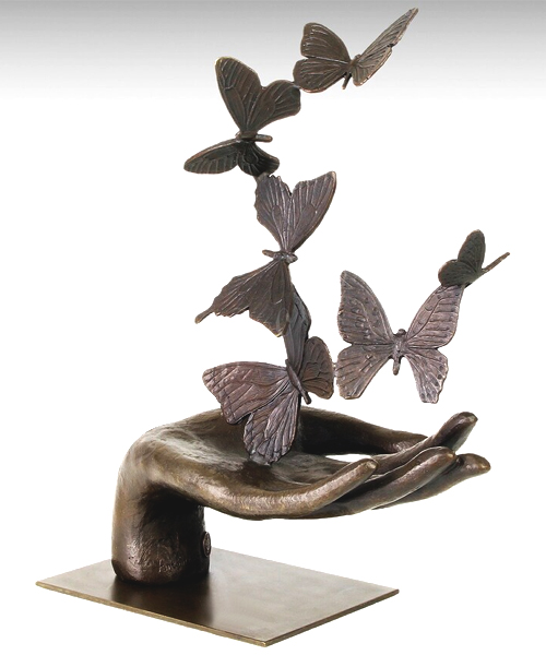 Hand Unleashing Butterflies Bronze Sculpture